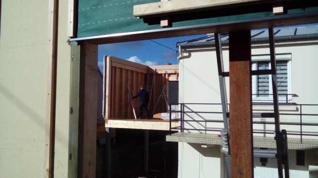 extension bois sur pilotis