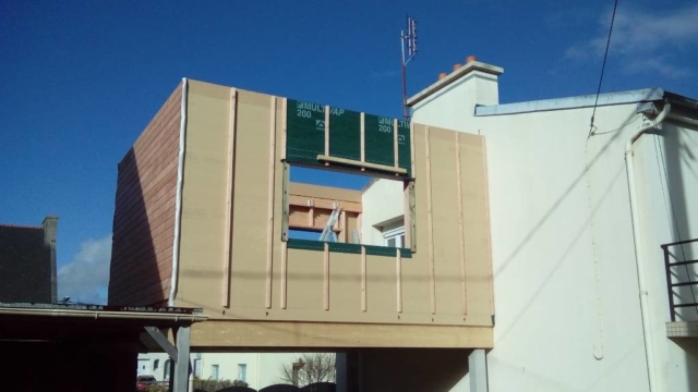 extension bois sur pilotis