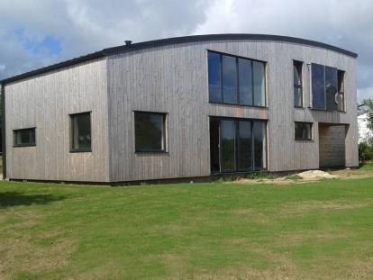 Maison bois toit cintré Finistère Trégana