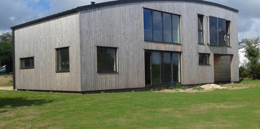 Maison bois toit cintré Finistère Trégana