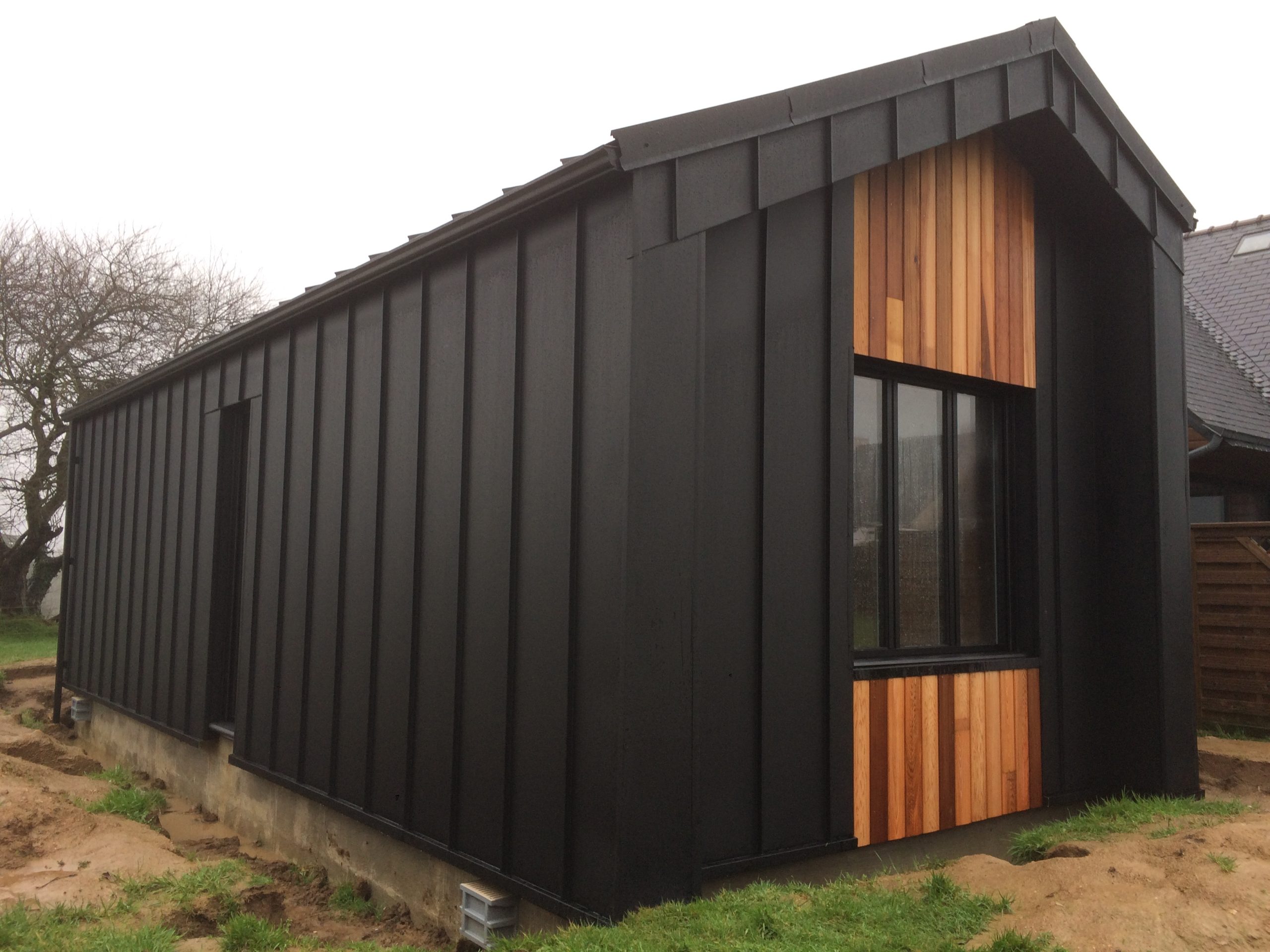 Extension ossature bois bardage aluminium et bois
