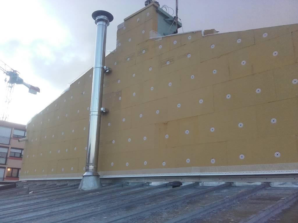 Isolation thermique par l'extérieur et extension bois