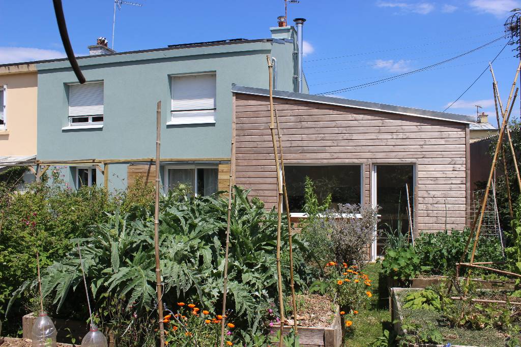 Isolation thermique par l'extérieur et extension bois