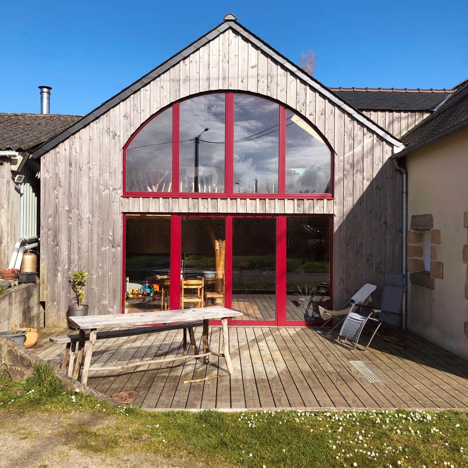 Extension ossature bois menuiserie cintrée