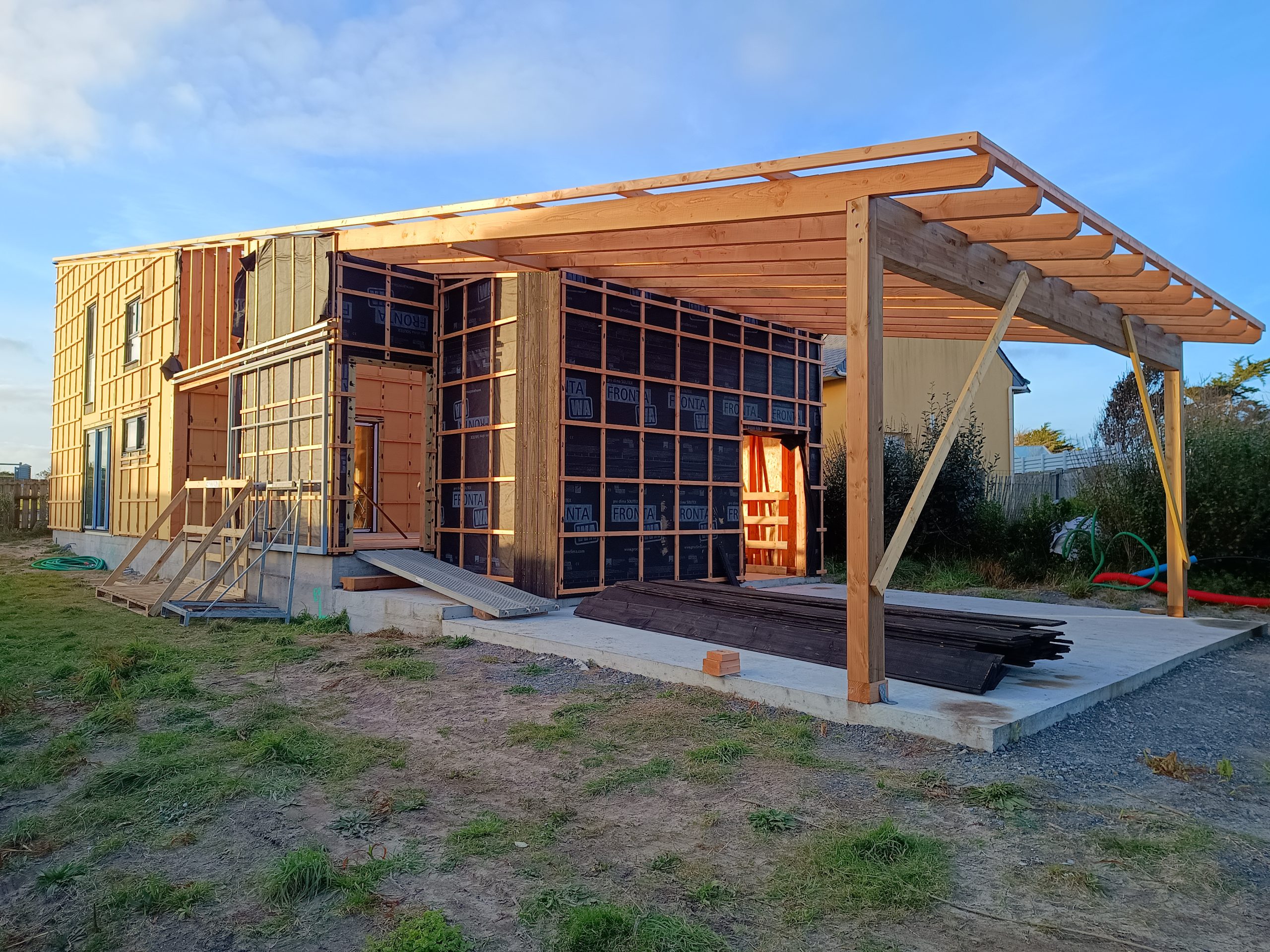 maison ossature bois avec jardin d'hiver