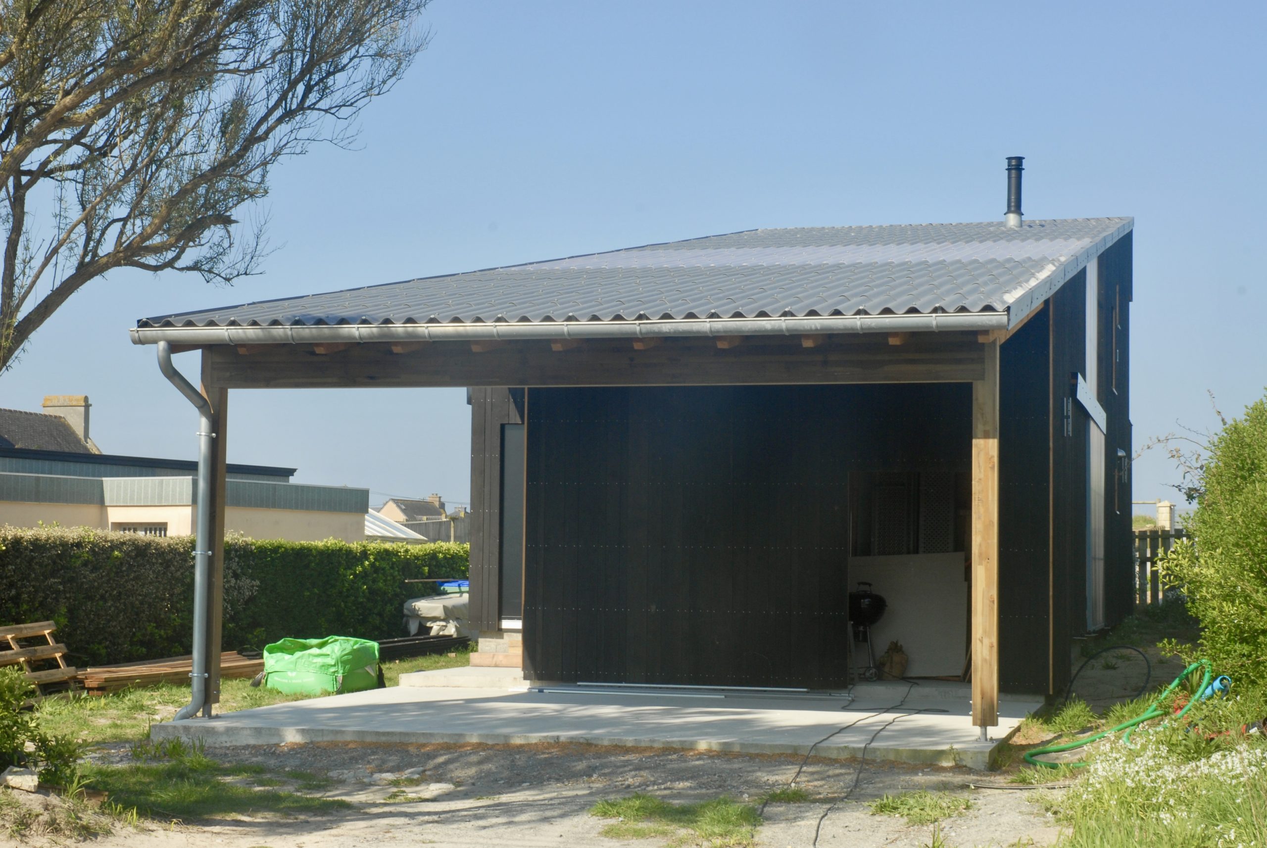 maison ossature bois avec jardin d'hiver