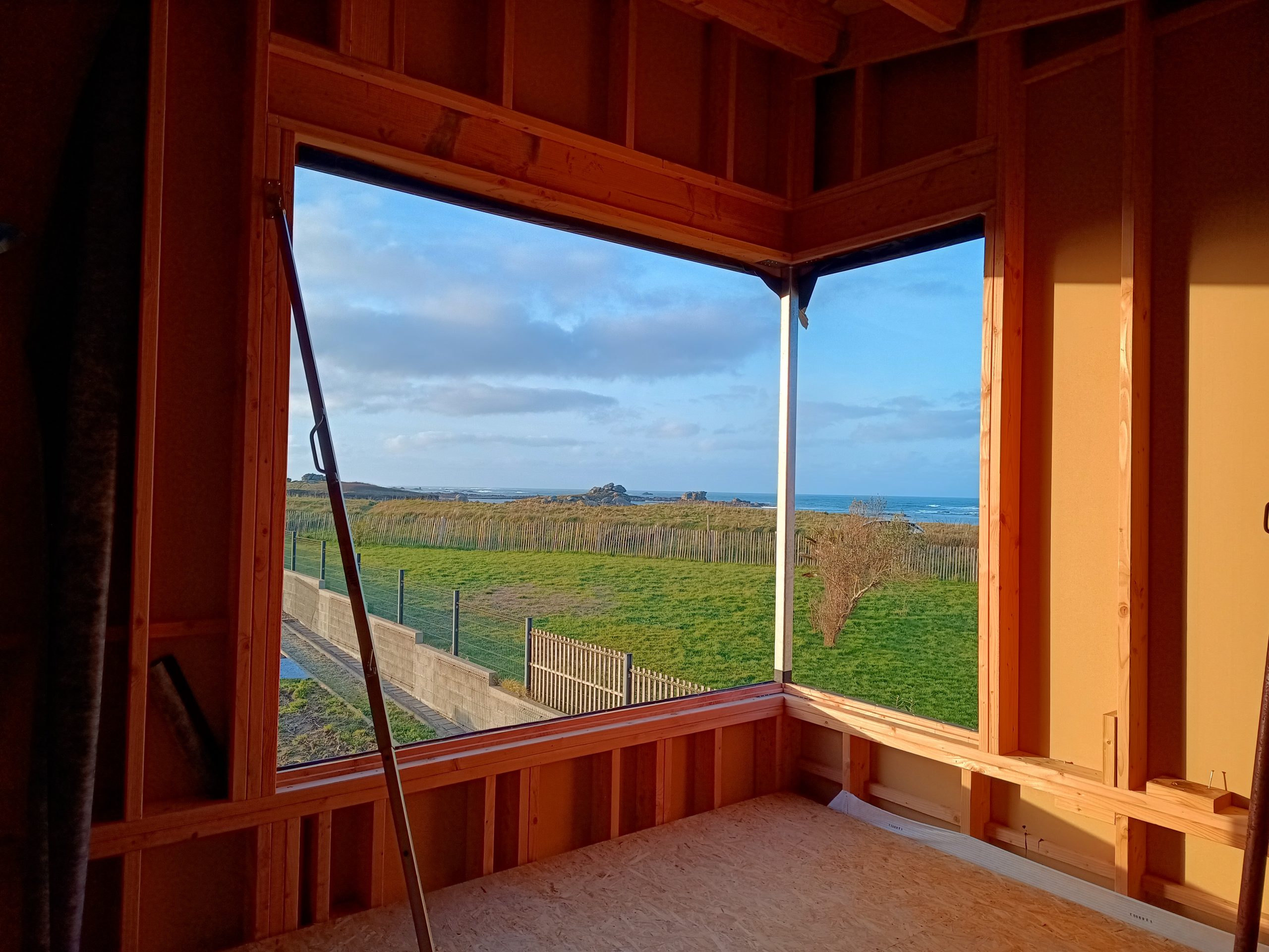 maison ossature bois avec jardin d'hiver